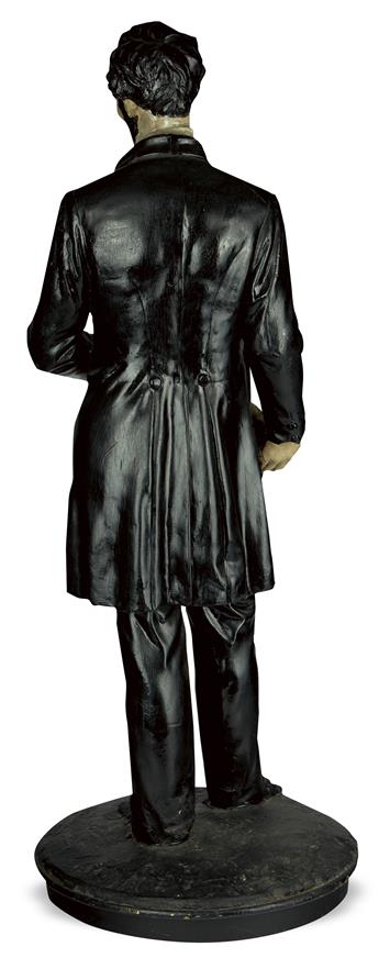 (LINCOLN, ABRAHAM.) Full-figure statuette of Lincoln holding the Emancipation Proclamation, after Volk.